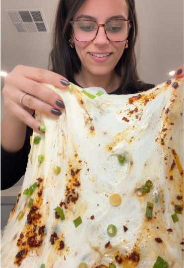 TikTok post by @lizzygbakes: Part 1|| Spicy chili green onion crisp sourdough loaf