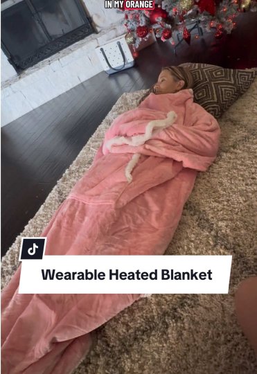 TikTok post by @thekristig: This wearable heated blanket is so nice!! So soft and so cozy! My dog loves it too!!
