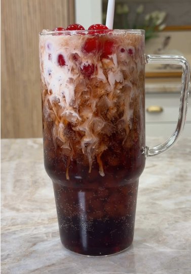 TikTok post by @sam.shan.shops: Dirty cherry coke soda 🍒🥤🧊 caffeinated drinks at home are the only thing that gets me…