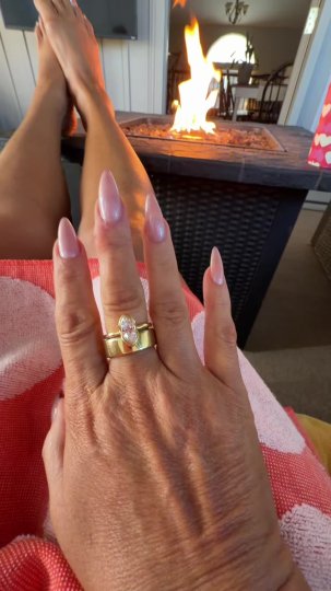 TikTok post by @dontbossmebecky: The creator showcases a new marquise-cut gold ring styled as a stackable accessory…