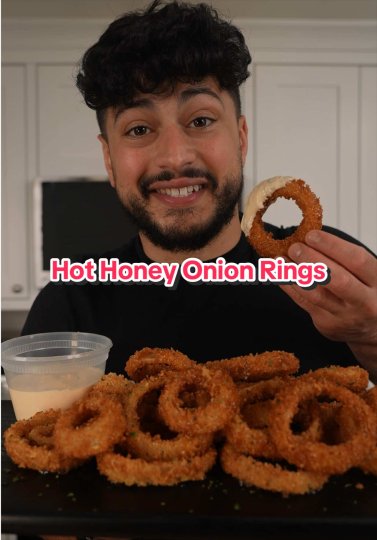 TikTok post by @thegoldenbalance: Crispy Hot Honey Onion Rings 🤭 Recipe: 2-3 large white or yellow onions 1 egg 3 cups milk…