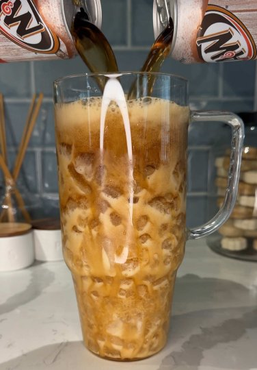 TikTok post by @ashleymarkleeats: pretty sure this vanilla protein dirty soda will solve all my problems 🥤